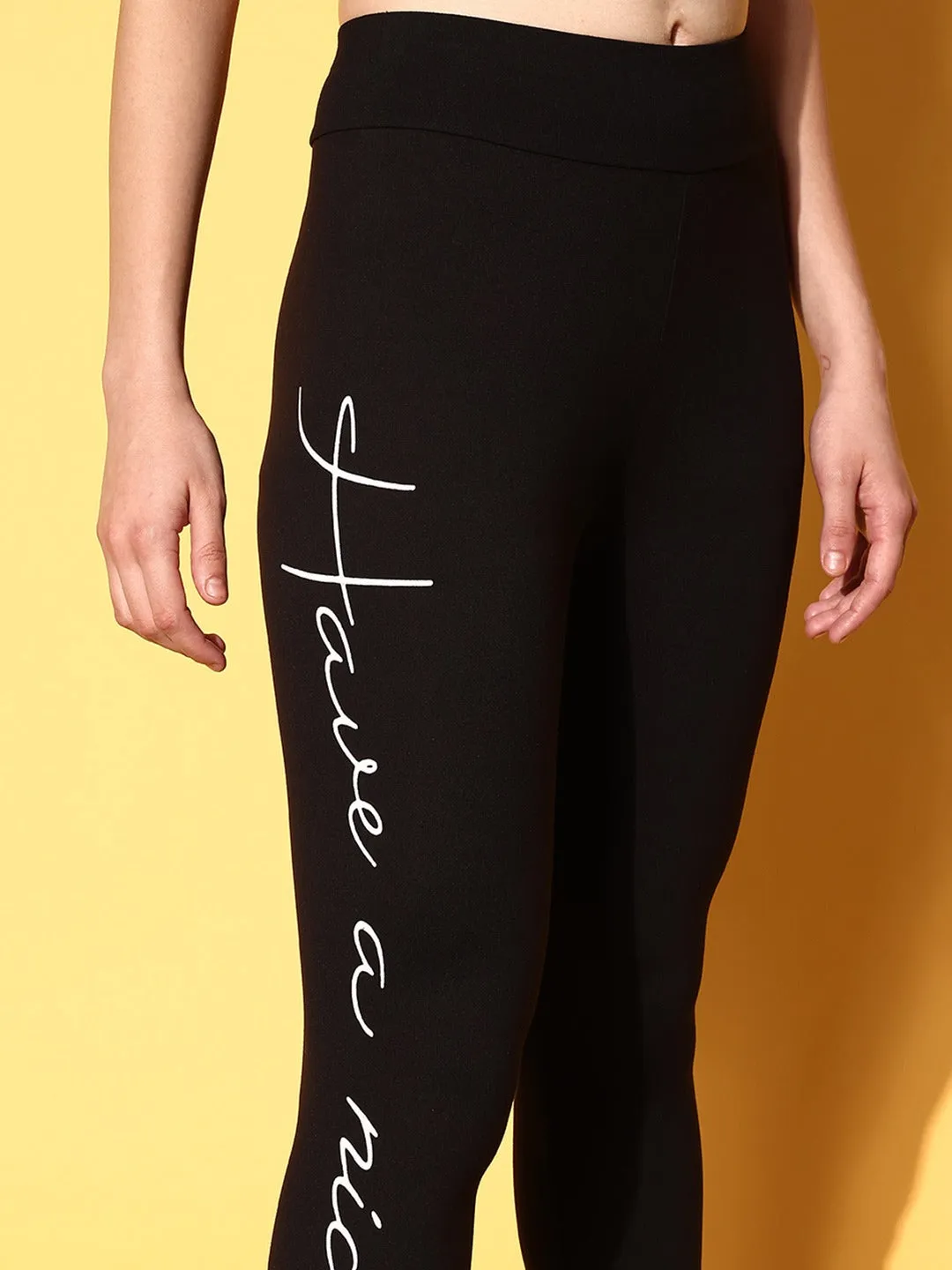 Berrylush Women Black Typography Printed Elastic High-Rise Waist Slip-On Regular Sports Tights